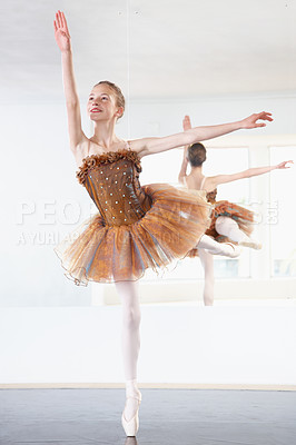 Buy stock photo Ballerina, dancing and ballet dancer studio with training, exercise and performance workout. Tutu, balance and pointe with a female athlete and happy with practice and confidence with pose and smile