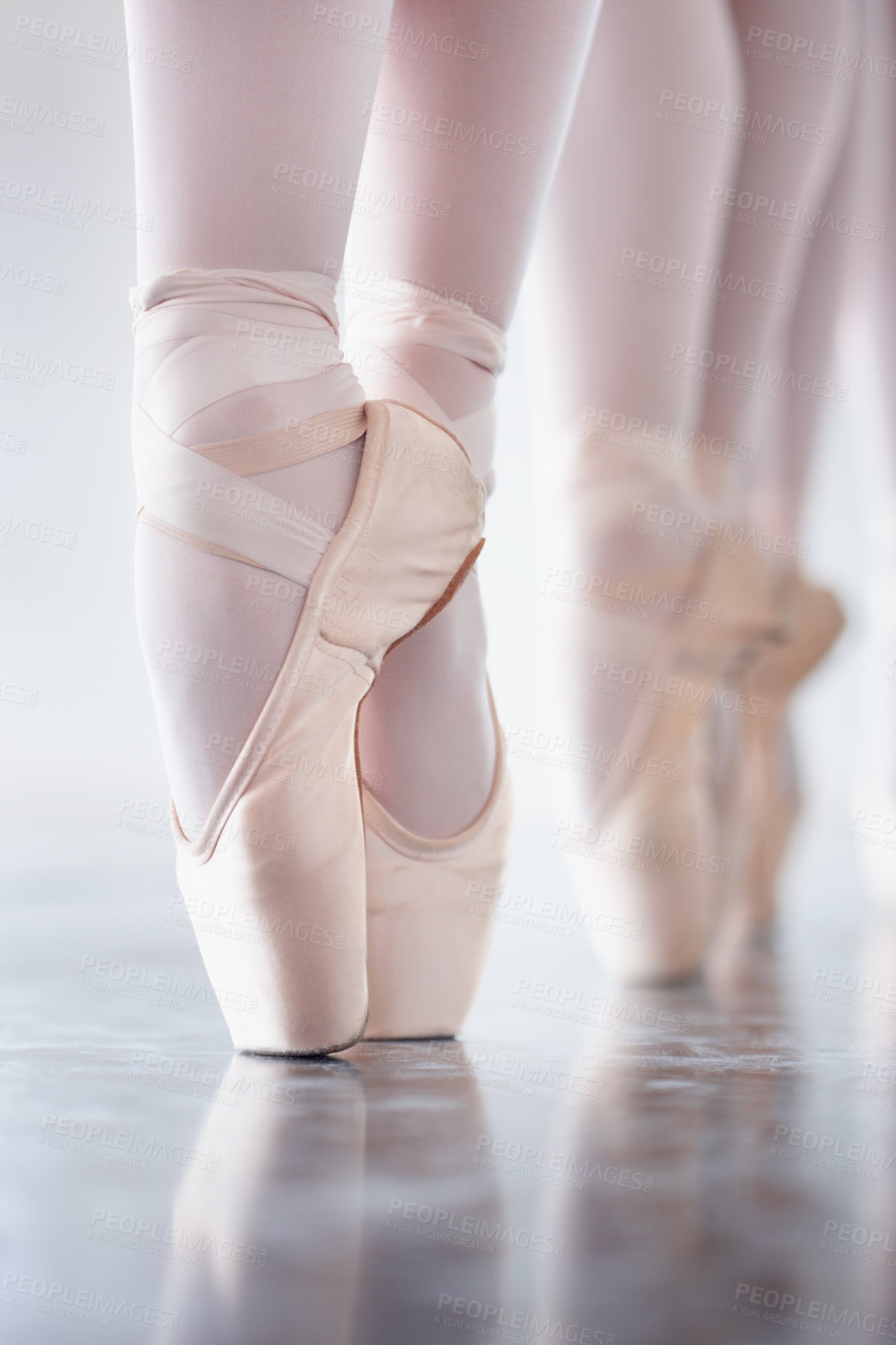 Buy stock photo Ballet, dance and shoes with the en pointe feet of a ballerina group in a studio for rehearsal or recital.   Creative, stage and theatre production with a dancer closeup training for an artistic show