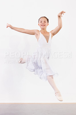 Buy stock photo Portrait, girl and jump in ballet studio for creative performance, dance and agile kid with talent, skill or action. Young child, ballerina and energy for learning musical theatre on white background