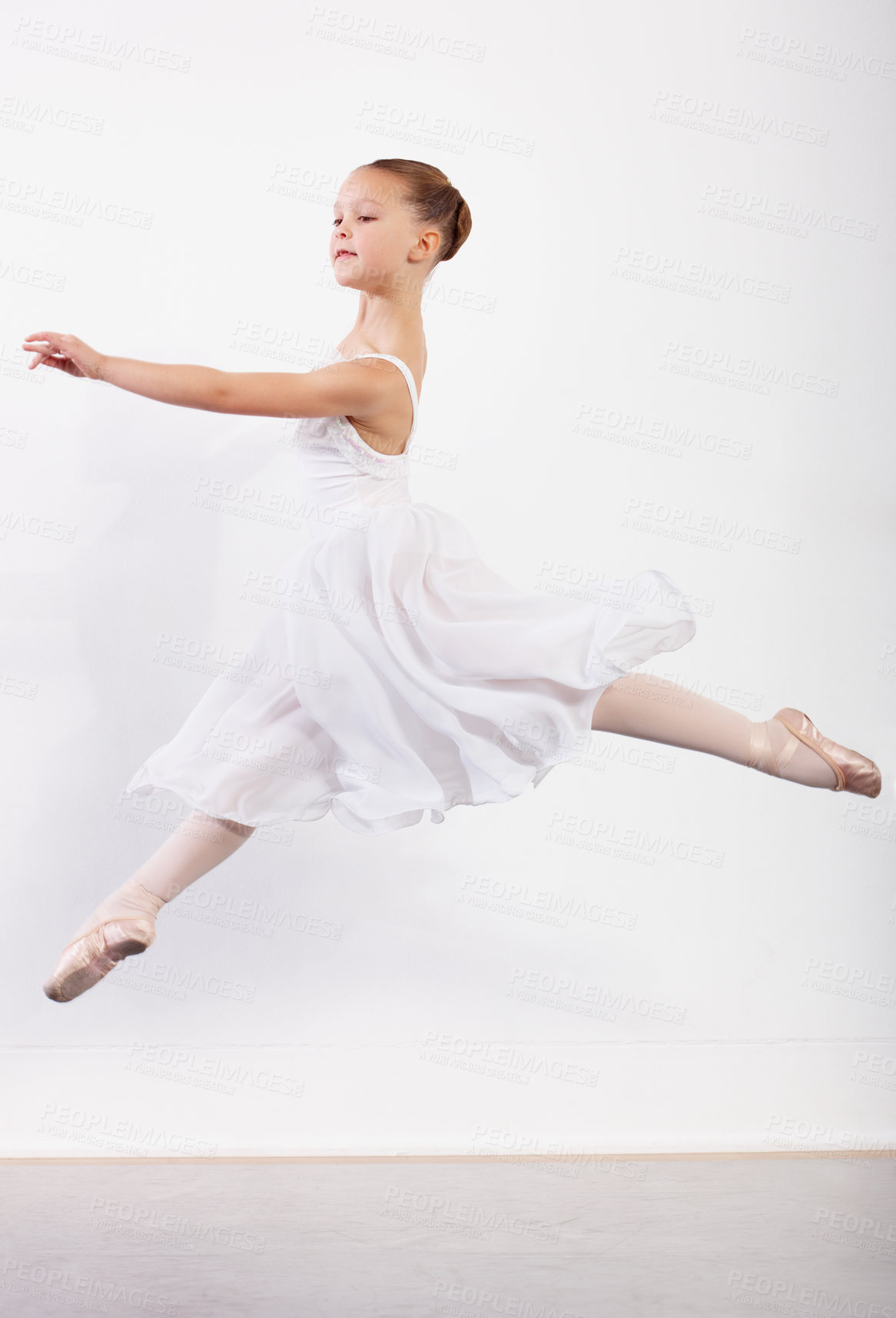 Buy stock photo Jump, movement and girl in ballet studio with pose, balance and performance class for children. Dance, talent and young ballerina dancer with pride, confidence and creative art at learning academy.