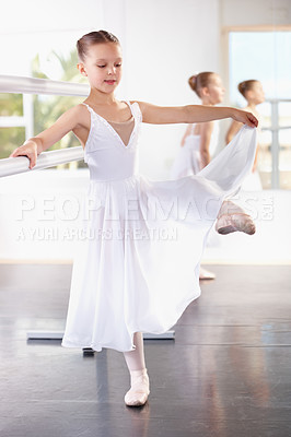 Buy stock photo Young girl, ballet training with dancer at academy, ballerina at practice and dancing at studio. Female child learning to dance in lesson, creativity with fitness and balance, focus and concentration