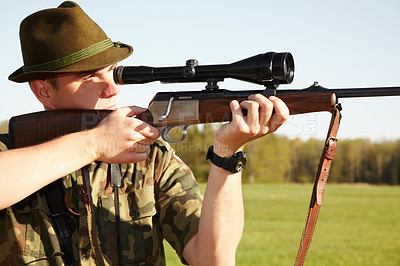 Buy stock photo Hunting, gun scope and man hunter on Africa safari in grass for shooting animals on holiday. Weapon, sniper and male person aim for wild game in nature with mockup and sport for target shot in sun