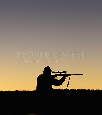 Buy stock photo A silhouette of a man in the outdoors holding up his sniper rifle