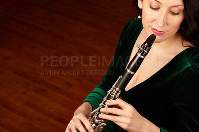 Buy stock photo Music, performance and woman with clarinet, mock up with orchestra musician and talent at classical show. Art, focus and mockup space, professional concert clarinetist with creativity and inspiration