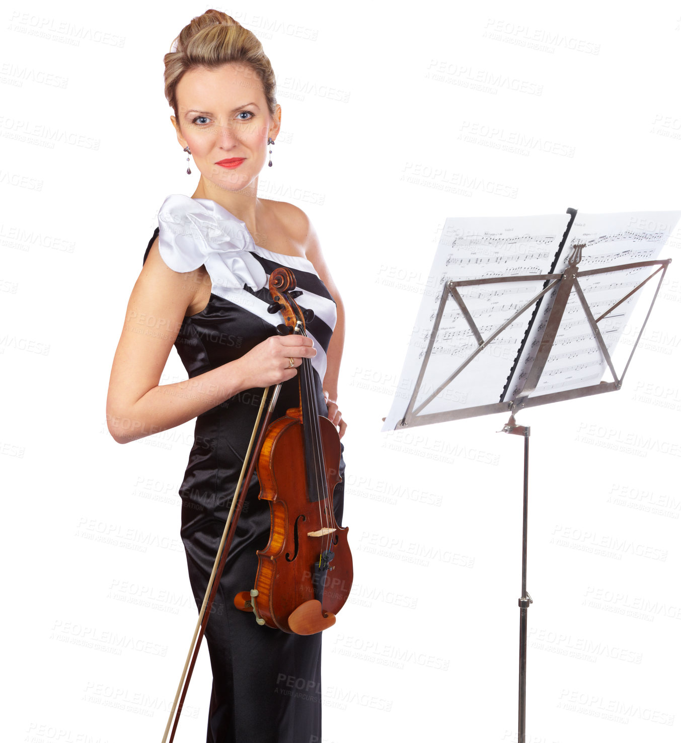 Buy stock photo A gorgeous violinist standing in front of a sheet music stand - portrait