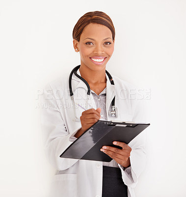 Buy stock photo Doctor portrait, woman and folder or documents for medical information, test results or evaluation in studio. Face of healthcare worker writing in charts or checklist on a wall or white background