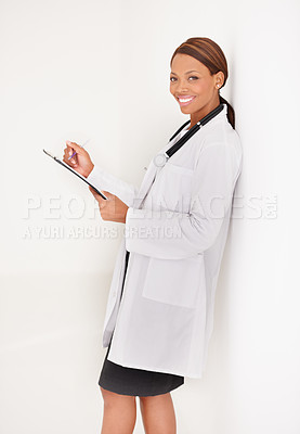 Buy stock photo Doctor portrait, woman with documents and writing in medical charts, test results or health evaluation in clinic. Happy healthcare worker with hospital folder or checklist on wall or white background