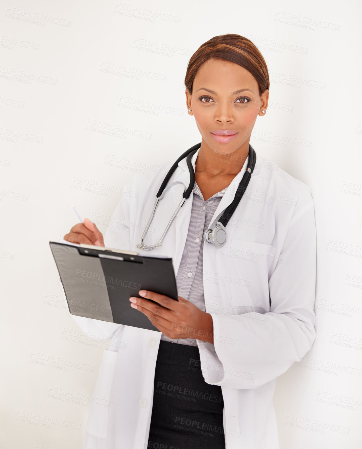 Buy stock photo Doctor portrait, woman and charts or documents for medical information, test results or evaluation in clinic. Face of african healthcare worker writing in folder on a wall or white background