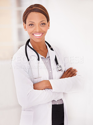 Buy stock photo Portrait, black woman and doctor with arms crossed, smile and confident employee with a stethoscope, lab coat and hospital. Face, African person and medical with professional, physician or healthcare