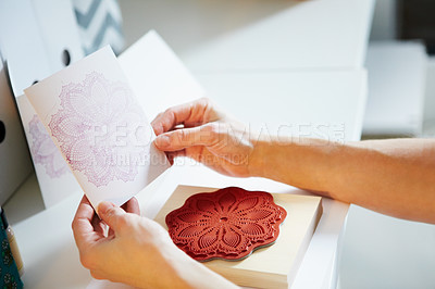 Buy stock photo Cropped shot of a woman's hands holding a hand-crafted card