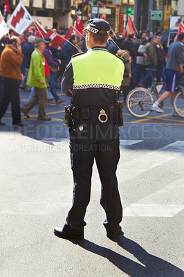 Buy stock photo Shot of police at a protest