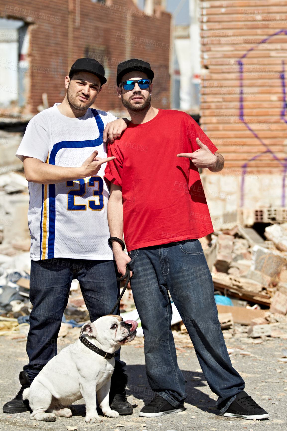Buy stock photo Portrait, gang and dog with man friends and their pet outdoor in a dangerous neighborhood together. Street, crime and culture with male gangsters and their bulldog puppy on an urban background