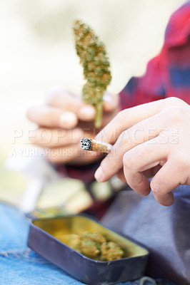 Buy stock photo Marijuana, bud or hands with weed blunt for calm peace to relax or help reduce pain, stress or anxiety. Cannabis head plants, smoking or closeup of person showing a joint for mental health benefits