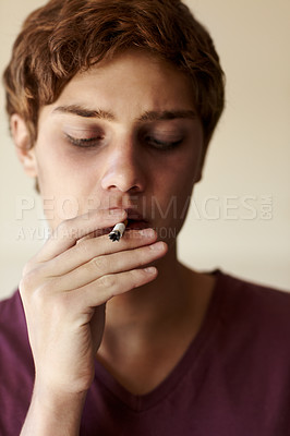 Buy stock photo Closeup of a person smoking a cigarette