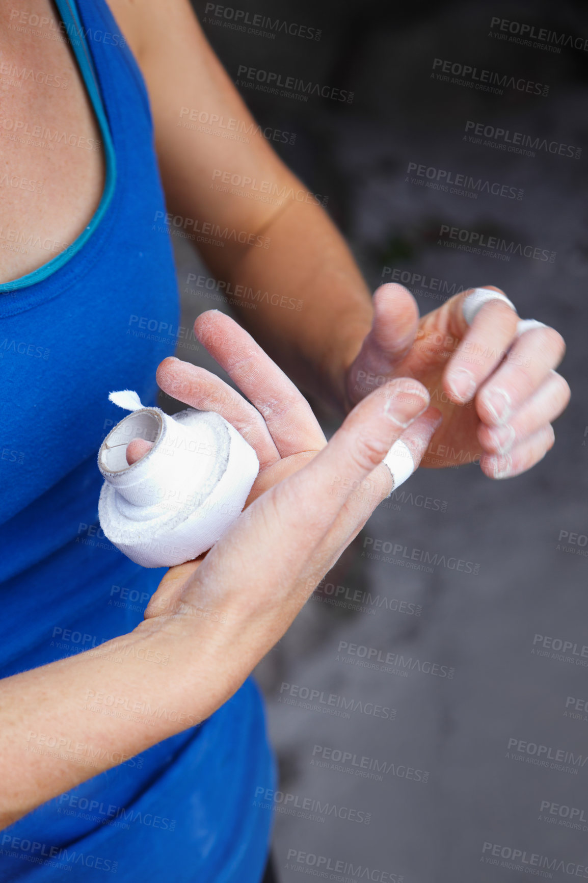 Buy stock photo Person, fingers and tape for rock climbing outdoor injury, grip strength or bandage support. Athlete, hands or band aid for danger challenge or stone mountain safety as adventure, brave risk on cliff