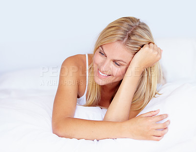 Buy stock photo Face, happy woman and smile for thinking on bed for nostalgia, memory and relaxing. Female person, joyful or excited expression with care for peace, quiet or calm for wellness, health or rest in home