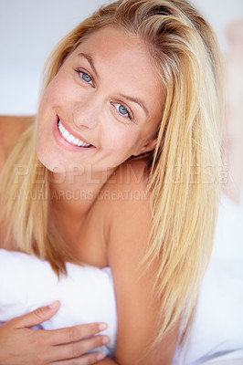 Buy stock photo Portrait of a happy young woman lying on her bed