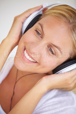 Buy stock photo Happy woman, smile and headphones for listening of music, freedom and wireless for fun in closeup. Female person, face and excitement for technology with podcast, radio or streaming service for relax