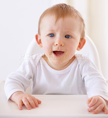 Buy stock photo Children, hungry and a baby in a high chair for breakfast or feeding in the morning for growth or development. Kids, kitchen and an adorable infant child in a seat for health, diet or nutrition