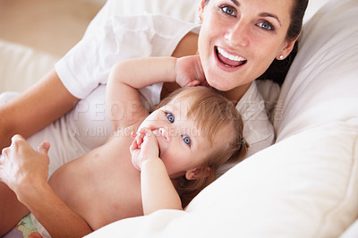 Buy stock photo Baby, mother and portrait or smile on sofa with peace, relax and parenting in living room of home with security. Family, woman and girl child with happiness on couch in lounge for development or love