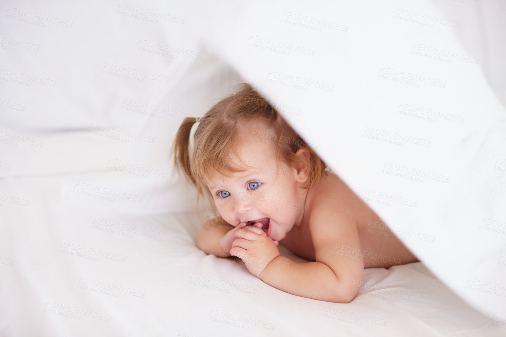 Buy stock photo Home, growth and child development with a baby in the bedroom to relax alone in the morning. Happy, kids or youth and an adorable young infant girl on a bed with blankets for comfort in an apartment