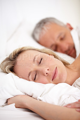 Buy stock photo Closeup portrait of a mature couple sleeping peacefully