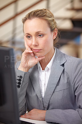 Buy stock photo Bored, office and business woman on computer for online proposal, internet and research at desk. Corporate, burnout and tired worker annoyed, frustrated and thinking for working, job and career