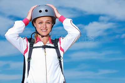 Buy stock photo Skydiving, worry and portrait of woman on adventure with helmet and anxiety or stress on sky background. Nervous, skydiver and face with fear at the start of stunt in countryside with safety gear