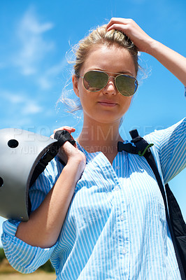 Buy stock photo Safety, helmet and woman on blue sky for adventure, outdoor or portrait in countryside with confidence. Person, ready and start of skydiving, stunt or risk danger with hardhat protection for security