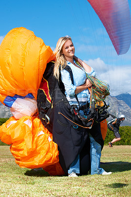 Buy stock photo Parachute, sport or woman in nature for portrait, smile or strings for exercise for flight preparation. Athlete, face or happy with travel for outdoor wellness, helmet or equipment in countryside