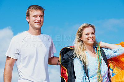 Buy stock photo Paragliding, parachute and man with woman in nature in health fitness, wellness and love in support. Young couple, happy and outdoor together with safety harness, smile and adventure in countryside