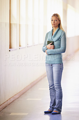 Buy stock photo Portrait, woman and teacher in a hallway, standing and education with knowledge in a school. Face, female person and educator in a lobby, serious and teaching with confidence, growth and mindset