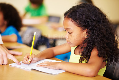 Buy stock photo Child, writing and hand of teacher helping student at school for education, learning or development. Woman teaching girl with notebook, pencil and knowledge in a classroom with support at desk