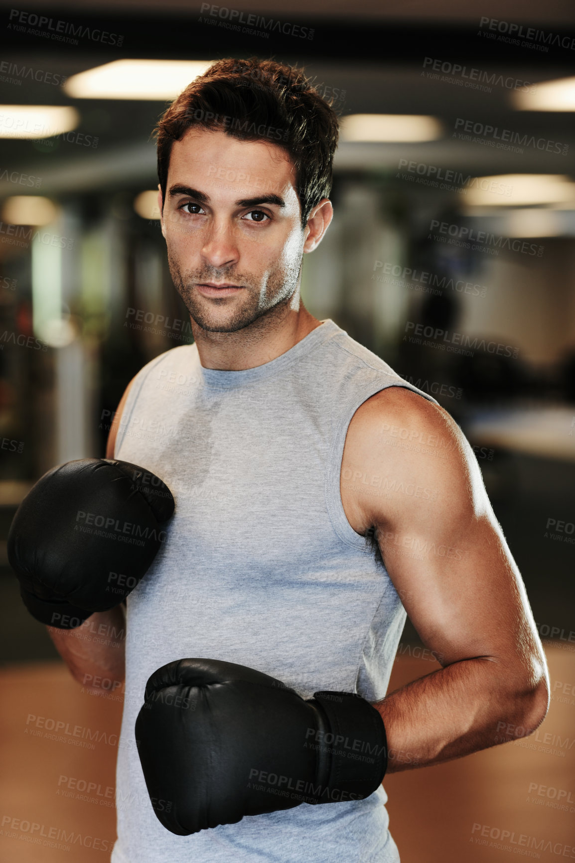 Buy stock photo Man, boxing gloves and exercise with gym portrait for health, wellness or training for fight, performance or sport. MMA, boxer or strong for contest, competition or workout for development with sweat