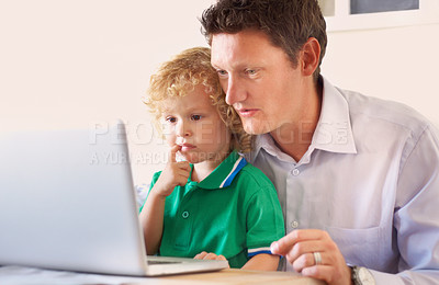 Buy stock photo Laptop, elearning and father with kid in home for homework, homeschool and studying. Computer, online education and child with dad for learning, teaching or knowledge, helping and bonding in house.