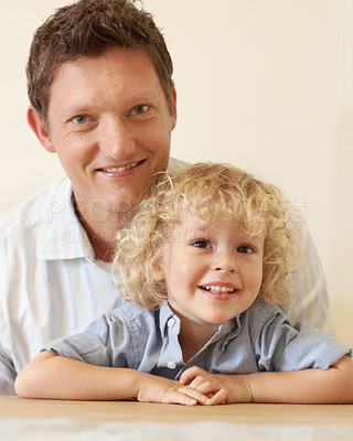 Buy stock photo Happy family, love and portrait of father with smiling son at their home. Happiness or quality time, bonding or togetherness and wellness of parent with young child enjoying indoor fun in living room