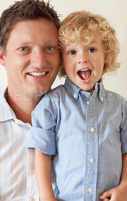 Buy stock photo Love, happy family and portrait of father with child in living room. Caring or happiness, people bonding and male single parent with son spending quality time together indoors at their home.