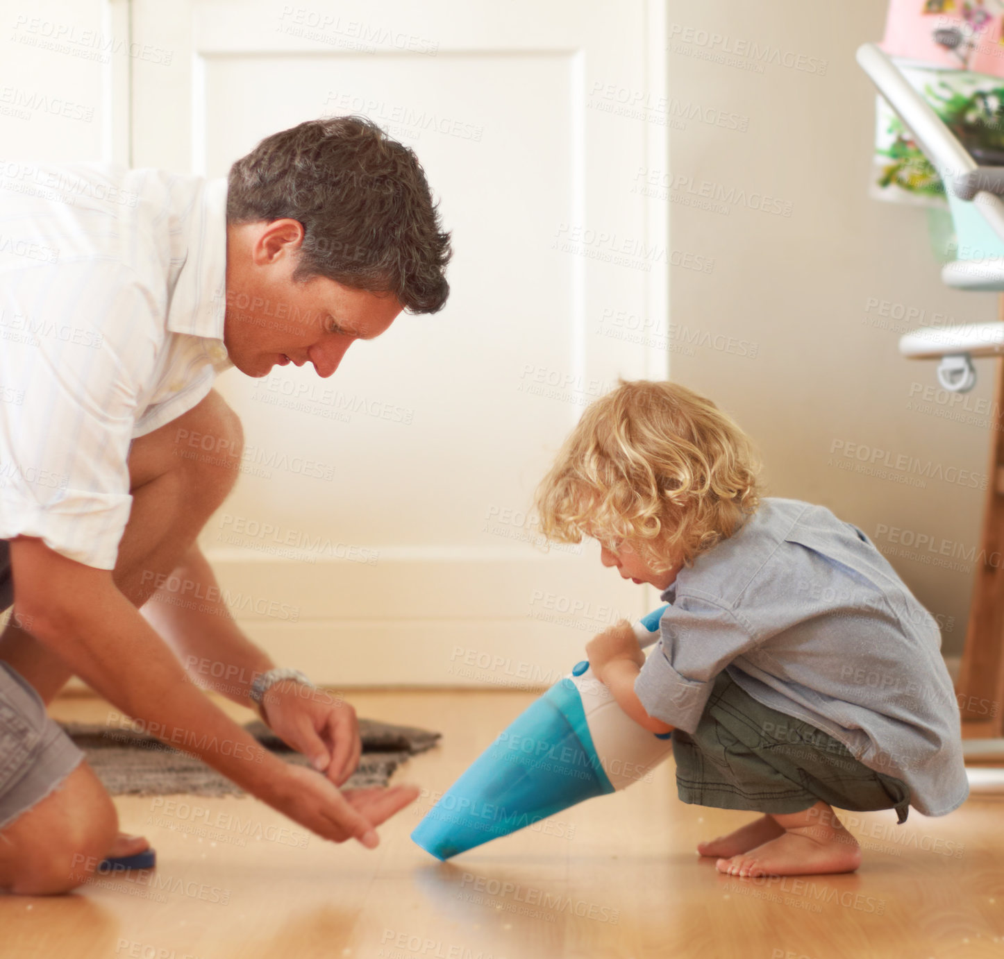 Buy stock photo Boy, father and vacuum floor with learning, support and cleaning in family home together with care. Man, male child and teaching life skills with love, bonding and development for clean flooring