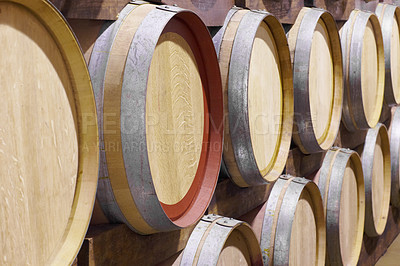 Buy stock photo Background, wine production and oak barrel in brewery for beer, alcohol manufacturing and whiskey fermentation. Closeup, wood cask and liquor storage container in winery, factory and distillery vault