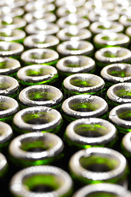 Buy stock photo Cropped closeup of green tops of wine bottles