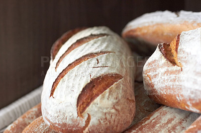 Buy stock photo Background, sourdough bread or closeup in bakery of fresh loaves, carbs and rustic grain for nutrition. Artisan confectionery, food industry or selection of baked buns in cafe, grocery store or diner