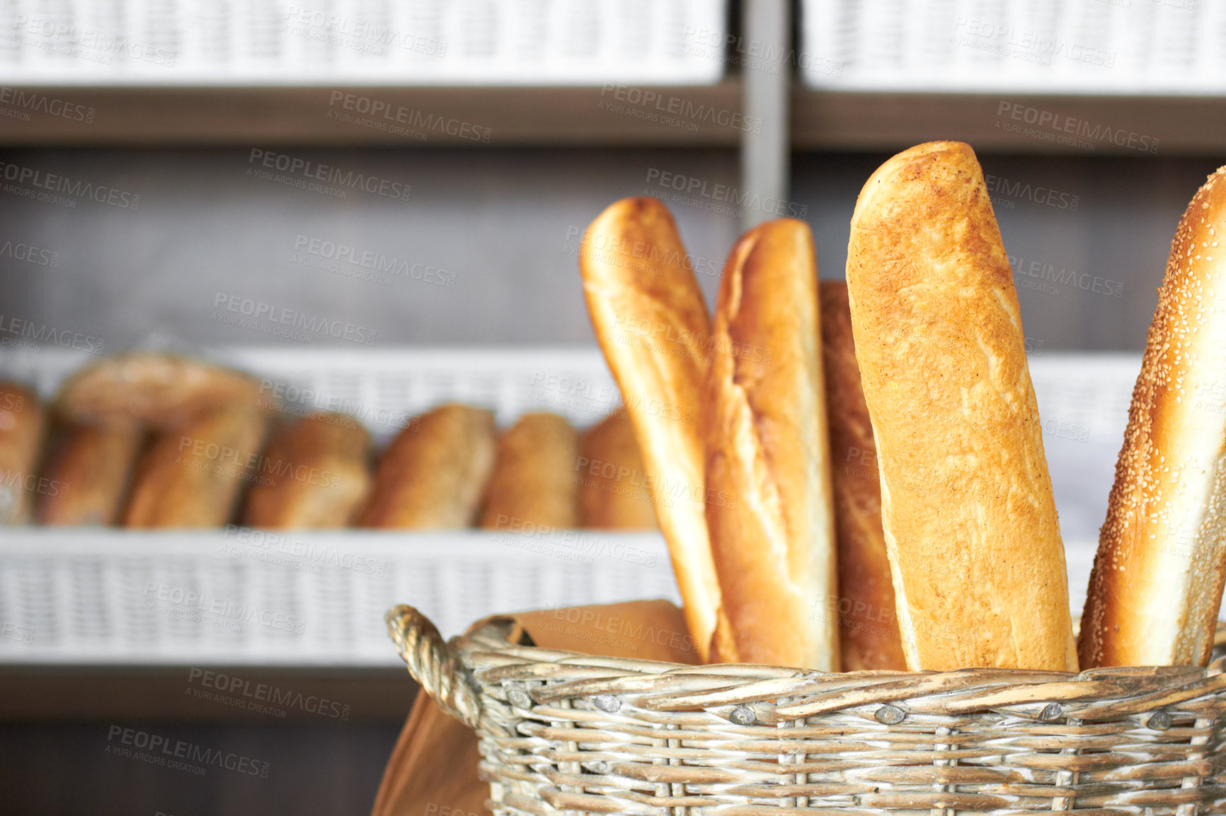 Buy stock photo Bakery, bread basket and a supermarket or grocery store for a diet or healthy food with nutrition on a shelf. Morning, kitchen and oven baked fresh roll or product for lunch or breakfast in a shop