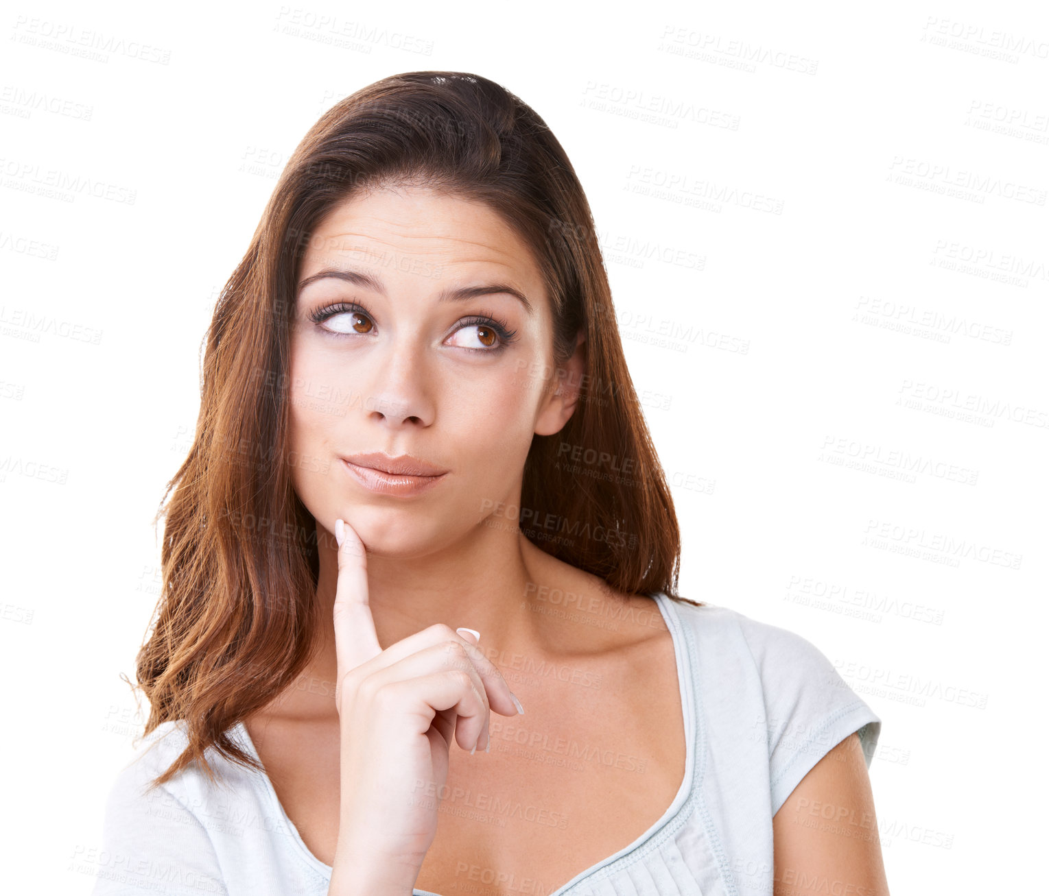 Buy stock photo A lovely young brunette looking away thoughtfully while isolated on white