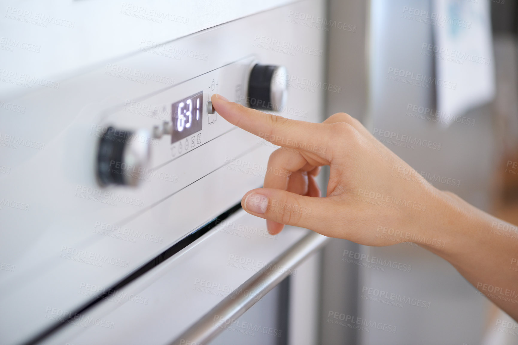 Buy stock photo Closeup, hand and button on oven for cooking in kitchen for heating, preparation and appliance. Person, press and switch for electronic, equipment or technology with number display in home for timer