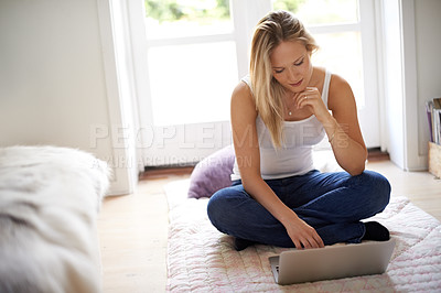 Buy stock photo Woman, laptop and remote work on floor in home, apartment or online education with internet course. Person, reading and typing on computer for university, elearning and project for college in house