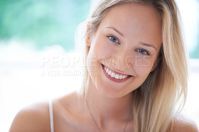 Buy stock photo Woman, headshot portrait and smile in home for confidence, relax or window in morning at apartment. Girl, happy or face for style, natural beauty or skin in room, calm or start day at house in Berlin