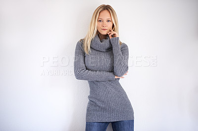 Buy stock photo Woman, portrait and serious in studio with fashion, winter style or trendy outfit with hands. Cool, face and assertive with person on mock up space with confidence, pride and edgy on white background