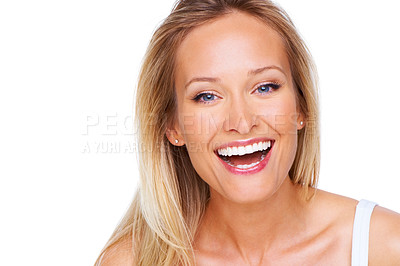 Buy stock photo A gorgeous young woman laughing while isolated on white