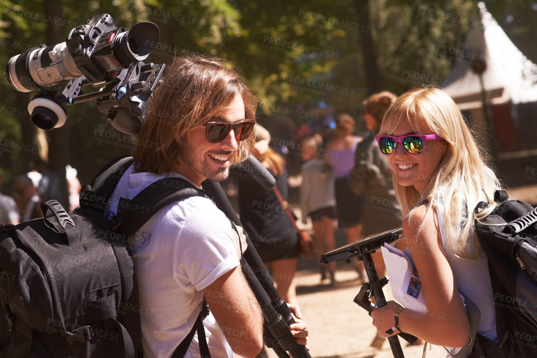 Buy stock photo Portrait, outdoor and man with woman, photographer and equipment with happiness, project and travel. Face, people and teamwork with camera, adventure and journey with a smile, sunshine and summer