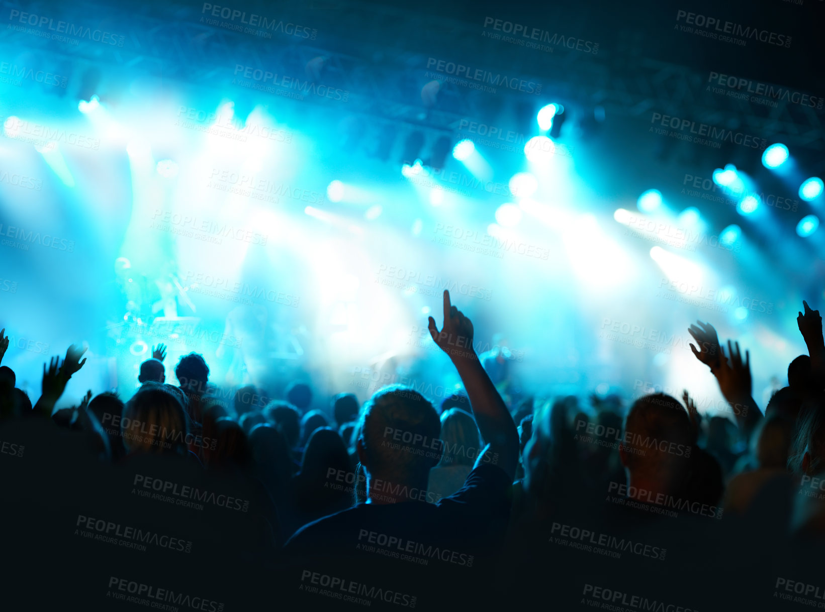 Buy stock photo Shot of a fans watching a live concert